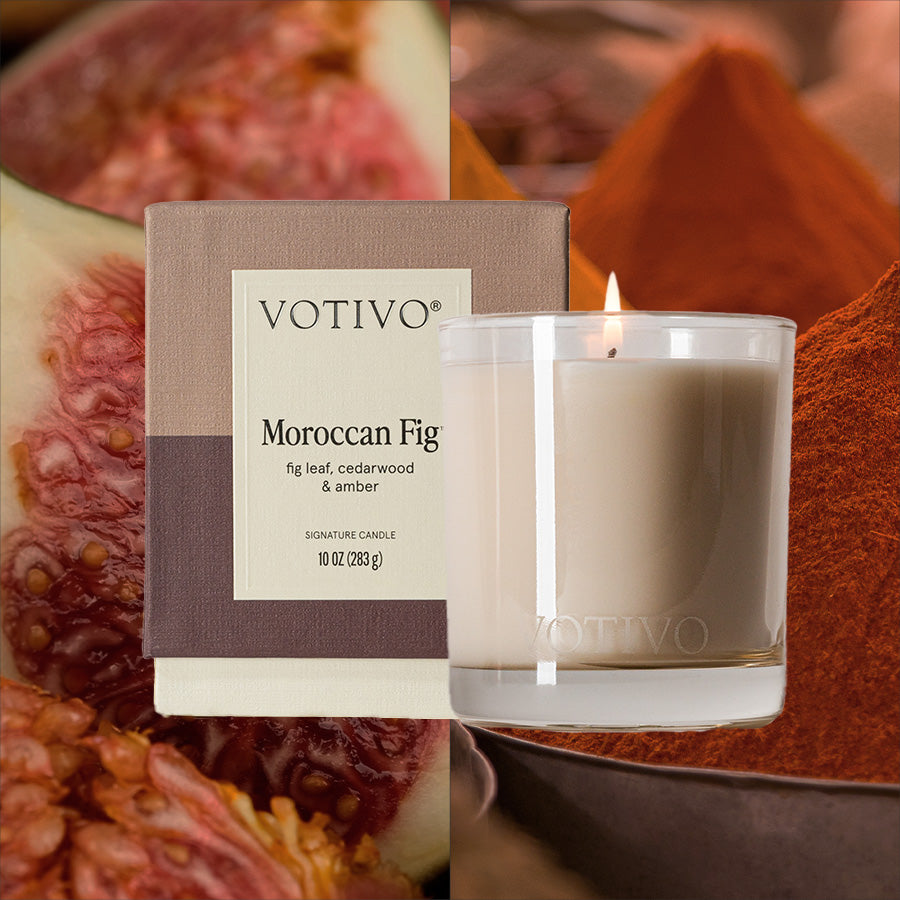 The Votivo Moroccan Fig 10 oz. Signature Candle is shown with its box, highlighting a fig fruit and spices. Crafted from premium soy blend wax, it delivers a clean, long-lasting burn.
