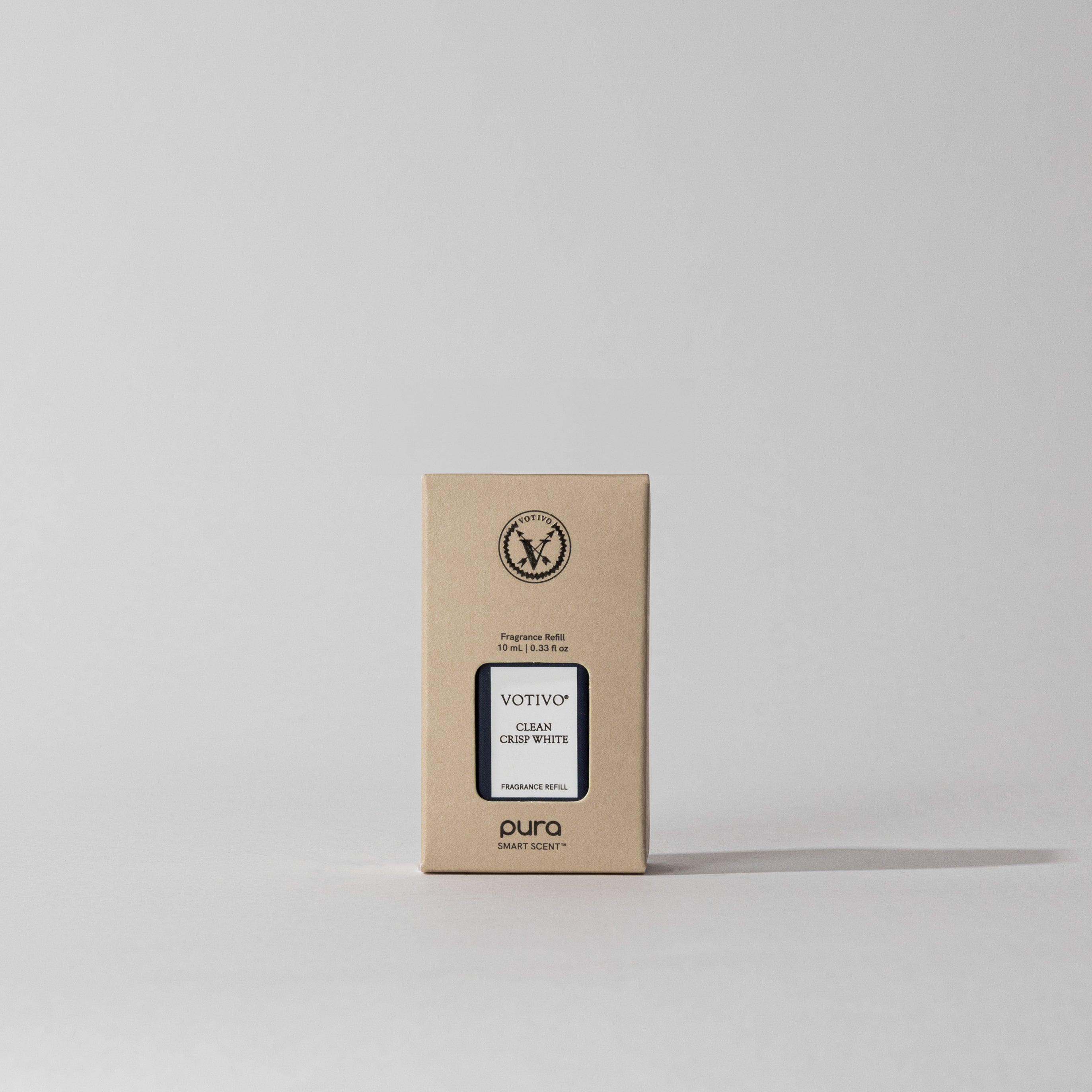 A Votivo Clean Crisp White Pura + Votivo Smart Fragrance Refill sits centered on a light grey background, highlighting smart home fragrance vials designed for a sophisticated ambience.