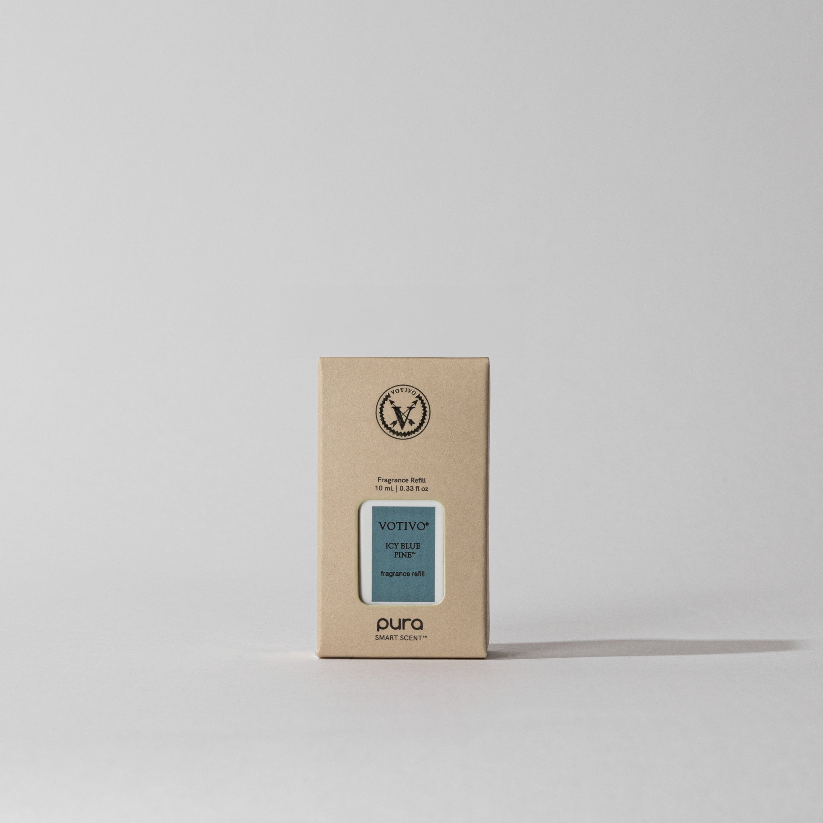 A beige rectangular box with a blue label shows the Votivo Icy Blue Pine Pura + Smart Fragrance Refill, ideal for your smart home diffuser or as a Votivo Pura refill, displayed upright on a plain white background.
