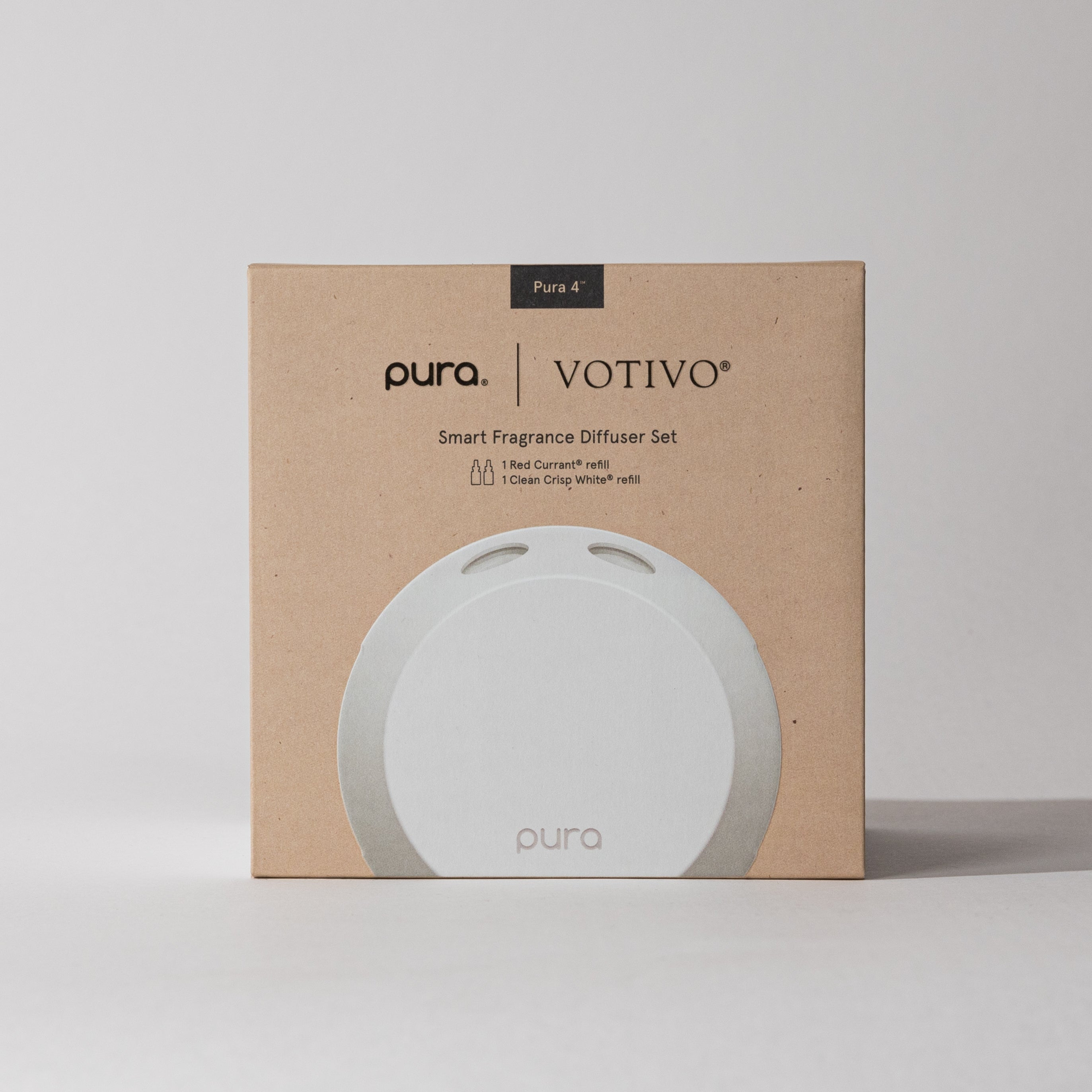 A brown and white box labeled "Red Currant & Clean Crisp White Pura + Votivo Smart Home Diffuser Set" by Votivo, featuring a minimalist design, round white diffuser image, fragrance info, and adjustable scent intensity on a plain background.